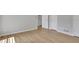 This bedroom features hardwood floors, with neutral paint at 6030 Sweet Creek Rd, Duluth, GA 30097