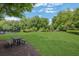 Well-manicured community picnic area with ample green space for outdoor recreation at 6030 Sweet Creek Rd, Duluth, GA 30097
