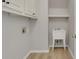 Laundry room with sink, cabinets, and convenient storage space at 6030 Sweet Creek Rd, Duluth, GA 30097