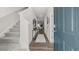 Inviting entryway featuring hardwood floors, a modern rug, and an open view into the living spaces at 2366 Haran Dr # 37, Lithonia, GA 30058