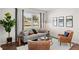 Bright living room with a large window, comfortable seating, and stylish decor at 2366 Haran Dr # 37, Lithonia, GA 30058