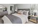 Inviting main bedroom with neutral tones, a well-dressed bed, and a view of the ensuite bathroom at 2366 Haran Dr # 37, Lithonia, GA 30058
