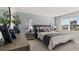 Serene main bedroom featuring a comfortable bed, natural light, and calming decor at 2366 Haran Dr # 37, Lithonia, GA 30058