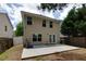 This backyard features a patio and fenced yard at 301 Silver Spring St, Dallas, GA 30157