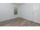 This bedroom features a window and durable flooring at 301 Silver Spring St, Dallas, GA 30157