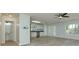 Open floor plan with updated kitchen and access to updated half bathroom at 301 Silver Spring St, Dallas, GA 30157