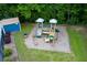 Aerial view of the community playground with play structures and a storage shed at 301 Silver Spring St, Dallas, GA 30157