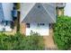 An aerial view of the backyard featuring a patio and partial tree coverage at 301 Silver Spring St, Dallas, GA 30157