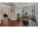 Charming dining area located off the kitchen, featuring hardwood floors and natural light for a cozy dining experience at 3174 Piney Woods Cir, Buford, GA 30519