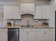 Well-equipped kitchen features granite countertops, stainless steel appliances, and white cabinetry for a functional space at 3174 Piney Woods Cir, Buford, GA 30519