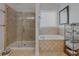 This luxurious bathroom features a stand-up shower with tile surround, a soaking tub, and a window for natural light at 3174 Piney Woods Cir, Buford, GA 30519