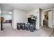 Finished basement area featuring carpet flooring and a door leading to another room at 3885 Weeping Willow Ln, Loganville, GA 30052