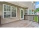 Spacious wooden deck with access to the backyard, perfect for outdoor entertaining at 3885 Weeping Willow Ln, Loganville, GA 30052