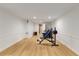 Large finished basement converted into a home gym with exercise equipment and recessed lights at 8260 Overview Ct, Roswell, GA 30076