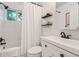 Bathroom featuring white vanity, mirror, bathtub, shower and tiled walls at 120 Biscayne Nw Dr # C13, Atlanta, GA 30309