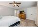 Bedroom showcasing hardwood dresser, area rug, ceiling fan and closet with bi-fold doors at 120 Biscayne Nw Dr # C13, Atlanta, GA 30309