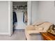 Bedroom featuring a closet, chair and carpeting at 120 Biscayne Nw Dr # C13, Atlanta, GA 30309