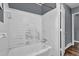Bathroom featuring a shower and tub at 1911 Rosewood Rd, Decatur, GA 30032