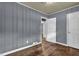 Bedroom with hardwood floors, baseboard trim and neutral walls at 1911 Rosewood Rd, Decatur, GA 30032
