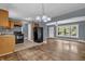 Open living room features hardwood floors, gray walls, and lots of natural light at 1911 Rosewood Rd, Decatur, GA 30032