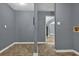 Spacious living room featuring tile flooring and neutral gray colored walls at 1911 Rosewood Rd, Decatur, GA 30032