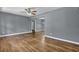 Open-concept living room features hardwood floors and natural lighting at 1911 Rosewood Rd, Decatur, GA 30032