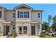 Charming townhome with brick accents, neutral siding, and well-manicured landscaping at 2362 Haran Dr # 35, Lithonia, GA 30058