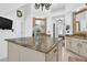 Granite counters, TV, and tile flooring adorn this immaculate bathroom at 765 Vinings Estates Se Dr, Mableton, GA 30126