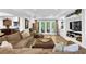 A relaxing basement living room features French doors to the exterior at 765 Vinings Estates Se Dr, Mableton, GA 30126