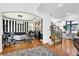 Bright living room featuring elegant decor, hardwood floors and a staircase at 765 Vinings Estates Se Dr, Mableton, GA 30126