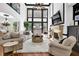 Elegant living room with a large window, fireplace, and comfortable seating at 765 Vinings Estates Se Dr, Mableton, GA 30126