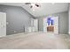 Spacious bedroom with vaulted ceiling and ensuite bathroom offers ample natural light and comfort at 1050 Hampton Hill Ct, Lawrenceville, GA 30044