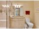 Bathroom featuring a glass-enclosed shower, vanity with granite top, and modern fixtures at 1942 N Akin Ne Dr, Atlanta, GA 30345