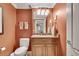 Traditional bathroom with a granite vanity and a neutral color scheme at 1942 N Akin Ne Dr, Atlanta, GA 30345