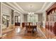 Spacious formal dining room with hardwood floors and a large dining table at 1942 N Akin Ne Dr, Atlanta, GA 30345