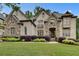 Beautiful two-story home with a manicured lawn and professional landscaping at 1942 N Akin Ne Dr, Atlanta, GA 30345