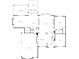 First-floor floor plan showcasing the layout of rooms, including the kitchen, living room, and garage at 1942 N Akin Ne Dr, Atlanta, GA 30345