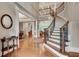 Grand foyer with hardwood floors, staircase, and open floor plan at 1942 N Akin Ne Dr, Atlanta, GA 30345