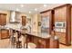 Bright kitchen with stainless steel appliances, granite countertops, and a large island with bar seating at 1942 N Akin Ne Dr, Atlanta, GA 30345