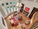 Overhead view of the living room featuring a fireplace, bookshelves, multiple windows, and comfortable seating at 1942 N Akin Ne Dr, Atlanta, GA 30345