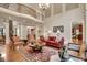 Bright living room features high ceilings, hardwood floors, elegant furniture, and an open layout great for entertaining at 1942 N Akin Ne Dr, Atlanta, GA 30345