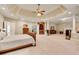 Large main bedroom showcases an ensuite bathroom, walk-in closets, fireplace, and coffered ceiling at 1942 N Akin Ne Dr, Atlanta, GA 30345