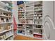 Walk-in pantry with custom shelving to maximize storage space, and organized for easy access to all your essentials at 1942 N Akin Ne Dr, Atlanta, GA 30345