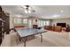 Open recreation room with ping pong table, media center, and lots of space for entertaining at 1942 N Akin Ne Dr, Atlanta, GA 30345