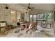 Relaxing covered porch with outdoor seating and a ceiling fan at 1942 N Akin Ne Dr, Atlanta, GA 30345