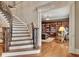 Staircase with hardwood floors and access to the library at 1942 N Akin Ne Dr, Atlanta, GA 30345