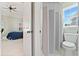 Bathroom adjacent to a bedroom featuring a convenient shower at 3456 Glen Mist Pl, Dacula, GA 30019