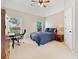 Well-lit bedroom with a comfortable workspace and a relaxing ambiance at 3456 Glen Mist Pl, Dacula, GA 30019