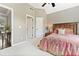 Charming bedroom with a view to living space, offering ample closet space and natural light at 3456 Glen Mist Pl, Dacula, GA 30019