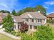 Beautiful home with manicured landscaping, brick facade, and a welcoming front porch at 3456 Glen Mist Pl, Dacula, GA 30019